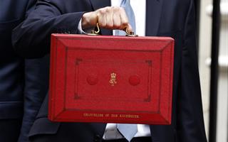 Chancellor holds up the red box on budget day